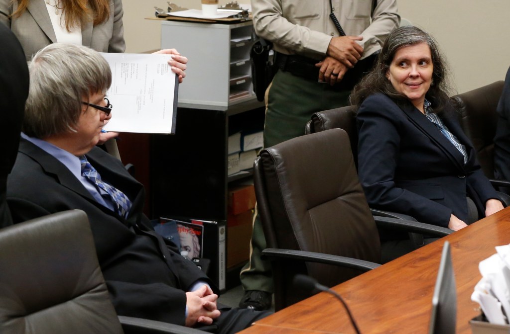 David Turpin and Louise Turpin glance at one another as they appear in court in Riverside, California, U.S., February 23, 2018. 