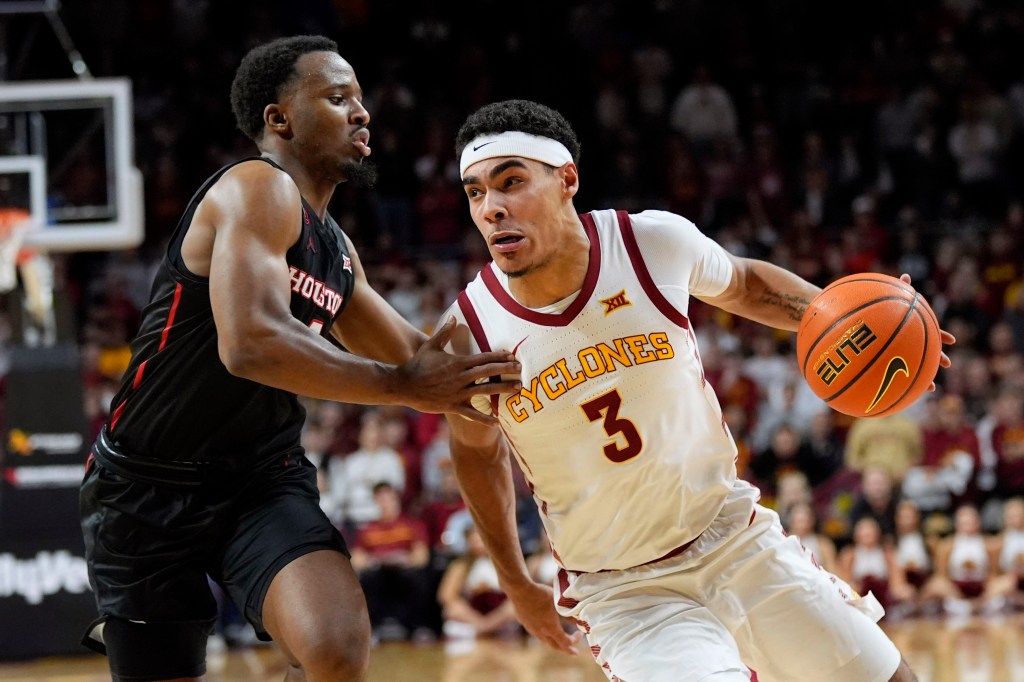 Iowa State guard Tamin Lipsey (3) drives to the basket past Houston guard L.J. Cryer on Jan. 9, 2024.