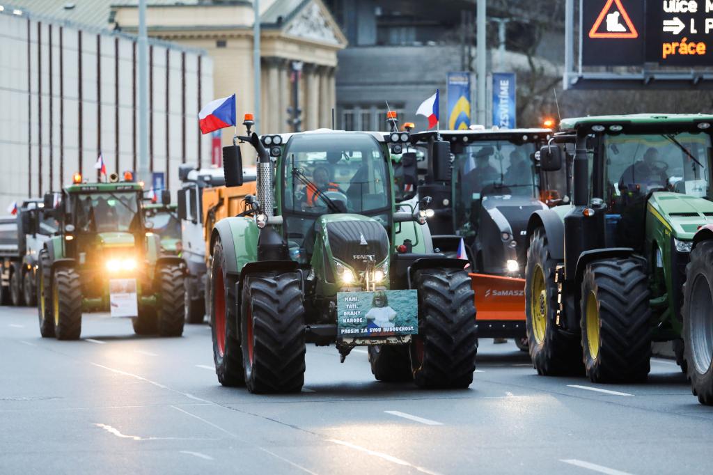 Farmers drive tractors during a protest against European Union agricultural policies, grievances shared by farmers across Europe, in Prague, Czech Republic, February 19, 2024. REUTERS/Eva Korinkova