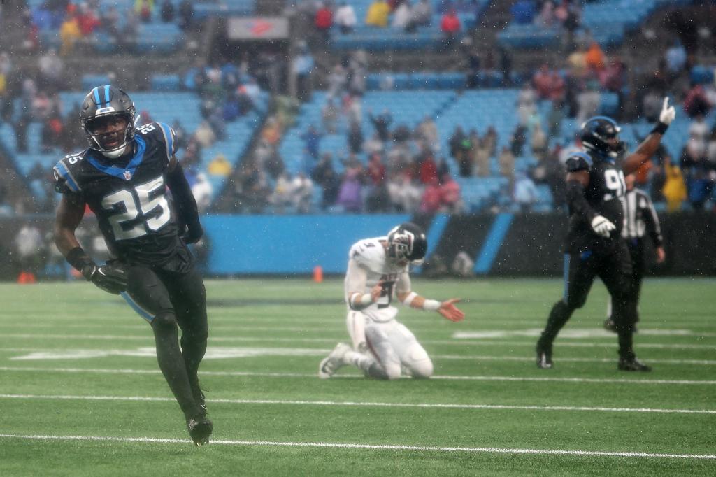 Desmond Ridder reacts after throwing an interception to the Carolina Panthers.