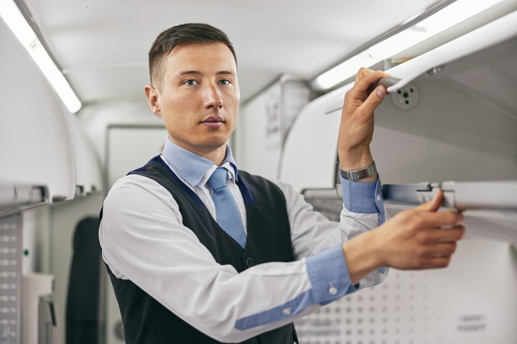 A flight attendant.