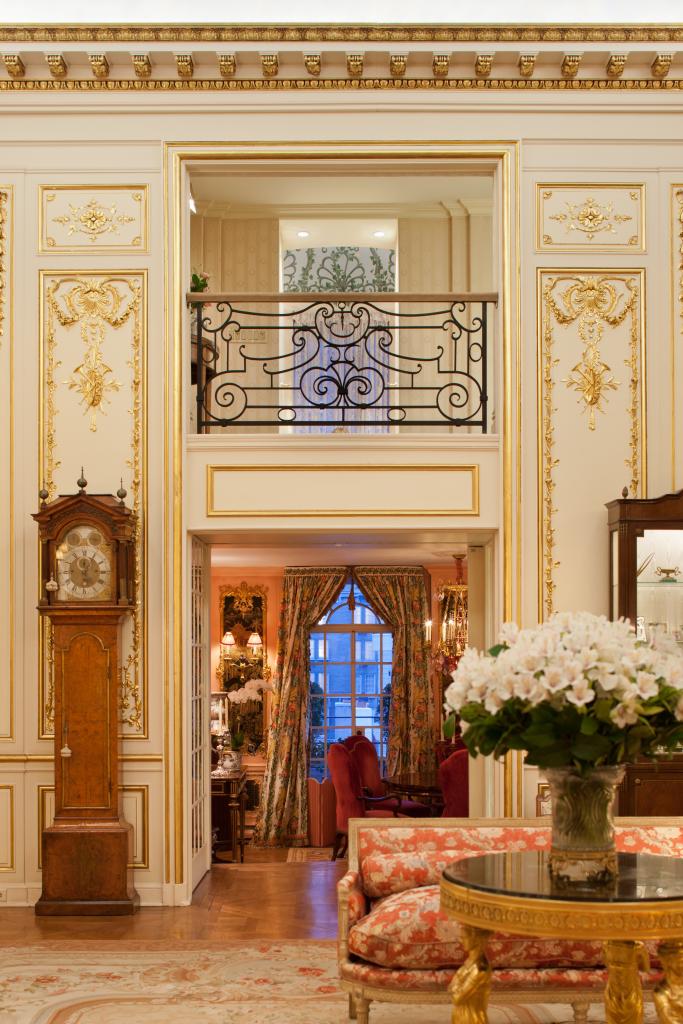 View showing an interior balcony, a doorway into another room, and a grandfather clock