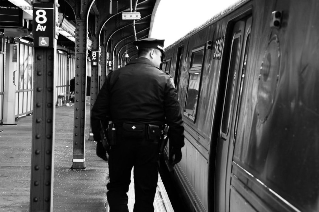 An NYPD cop seen patrolling the subway system.