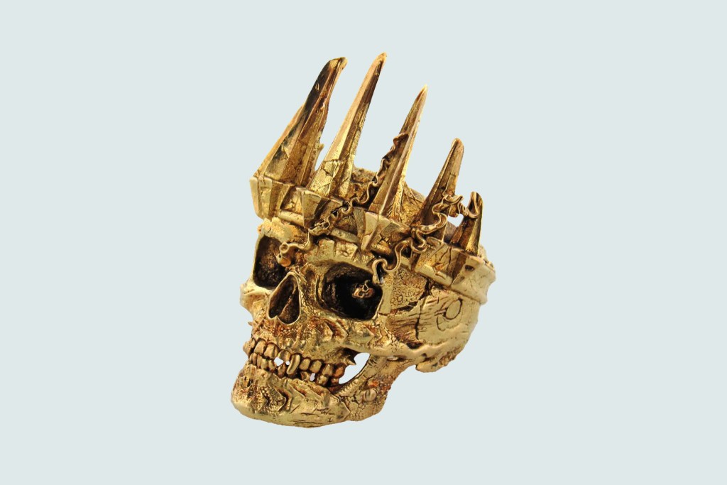 Gold skull ring with spikes