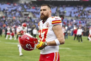 Travis Kelce #87 of the Kansas City Chiefs warms up prior to the AFC Championship NFL football game against the Baltimore Ravens.