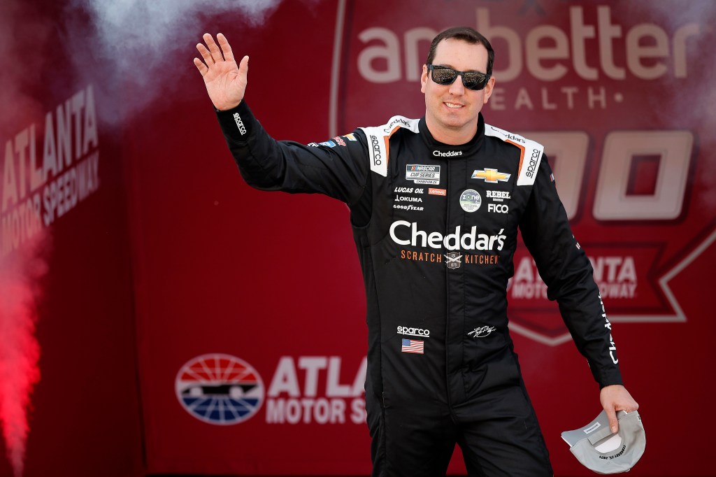 Kyle Busch waves to fans at the Atlanta Motor Speedway on Feb. 25, 2024.