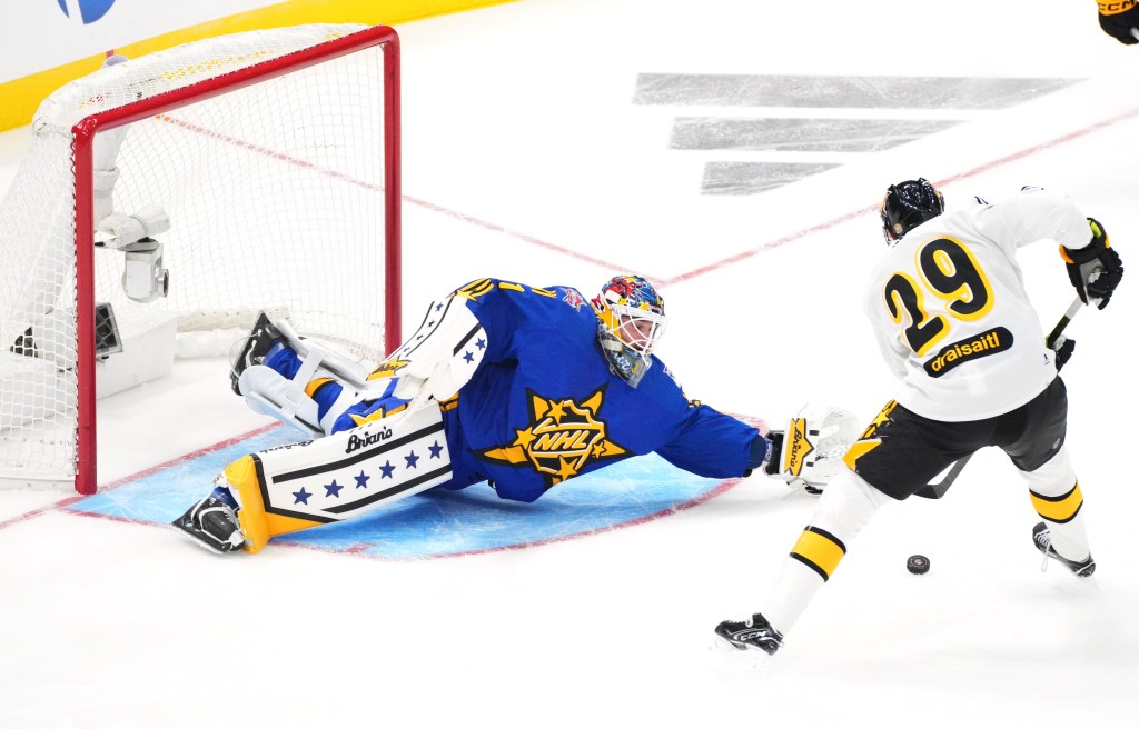 Leon Draisaitl #29 of the Edmonton Oilers of Team McDavid takes the puck to the net against Igor Shesterkin #31 of the New York Rangers of Team Matthews during their game at the 2024 Honda NHL All-Star Game.
