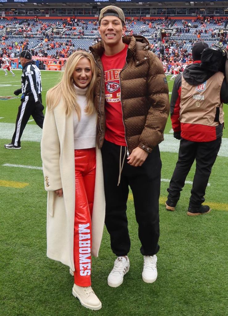 Brittany Mahomes with Jackson Mahomes during a Chiefs game.