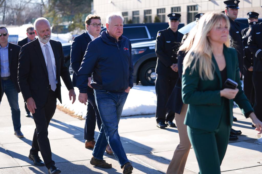 Minnesota Gov. Tim Walz arriving for a press conference on the shooting in Burnsville.