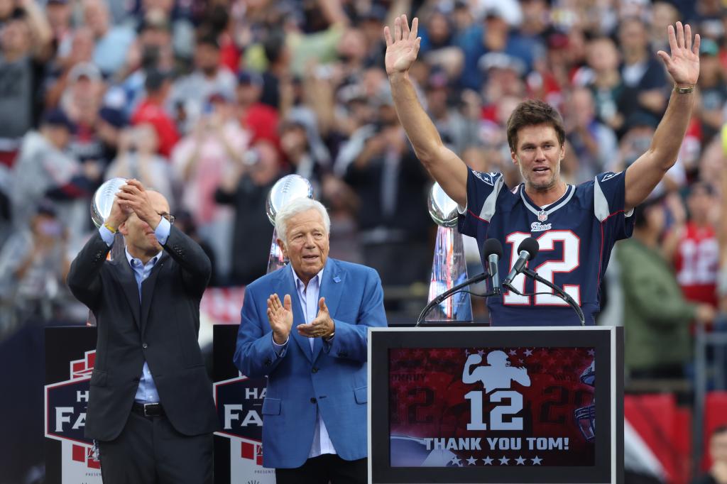 Tom Brady (12) with owner Robert Kraft during a Patriots ceremony honoring Brady on Sept. 10, 2023.