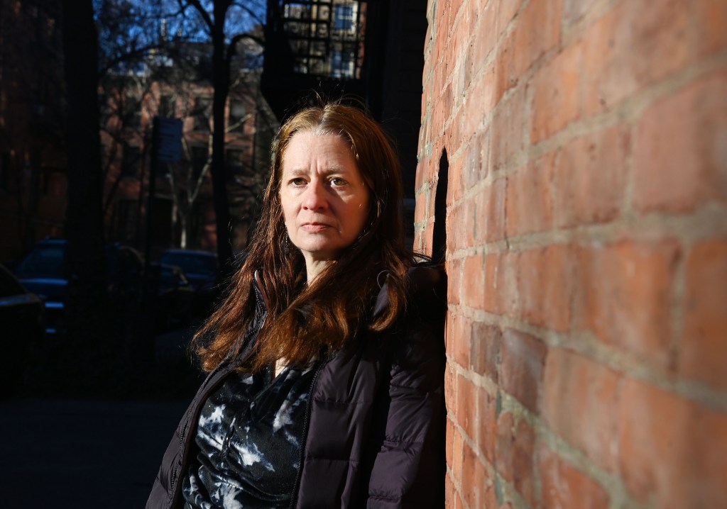 Jane Duncan stands outside in her West Village neighborhood.