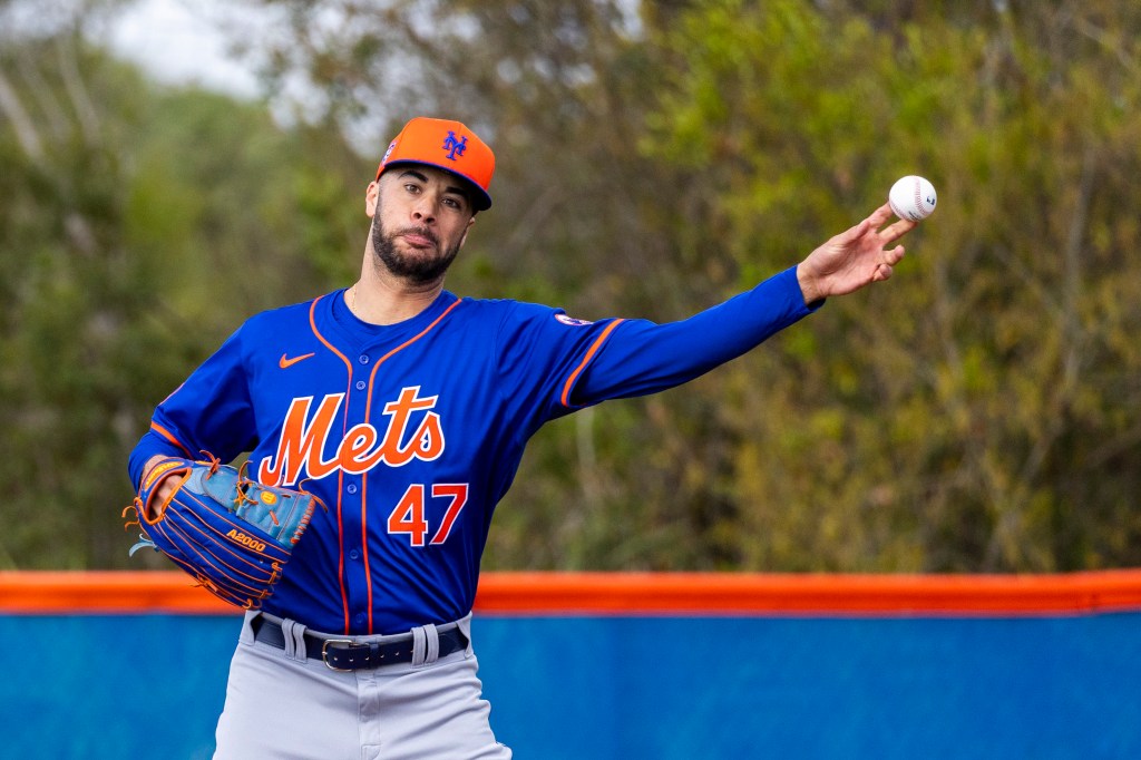 Mets starting pitcher Joey Lucchesi runs a drill at Spring Training