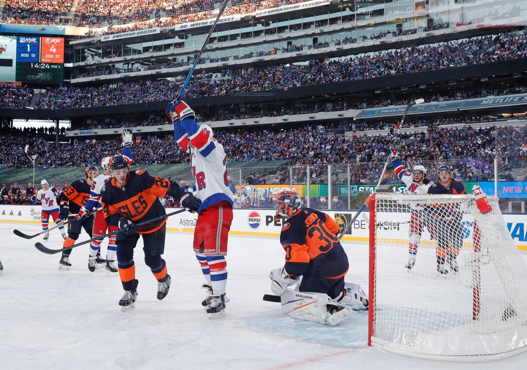 Rangers celebrate after New York Rangers center Vincent Trocheck scores a goal during the second period. on Sunday.