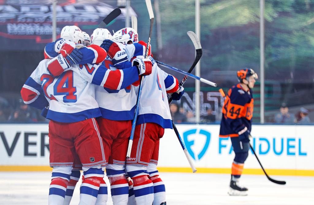 The Rangers rallied to beat the Islanders in overtime. 