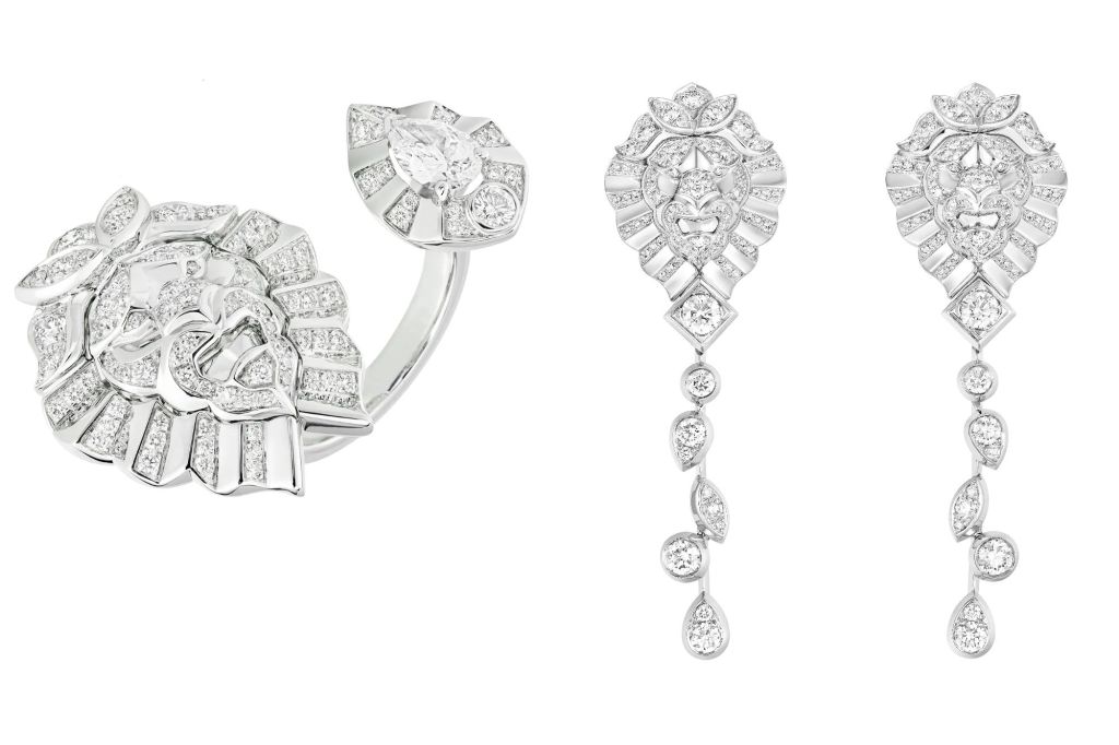 A Chanel ring (left) next to earrings (right).