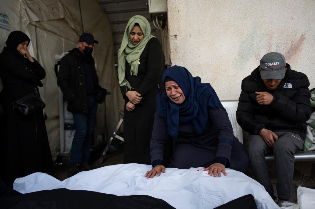 Palestinians mourn relatives killed in the Israeli bombardment in Rafah.