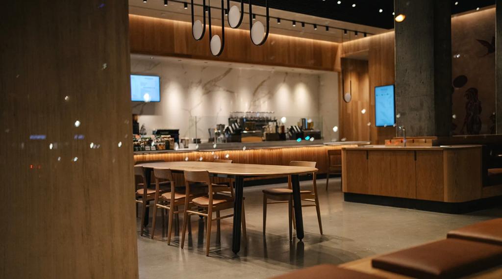 Starbucks' new floor plans will be barrier-free, will have softer lighting and will boast materials that reduce background noise -- a benefit to customers with hearing aids.