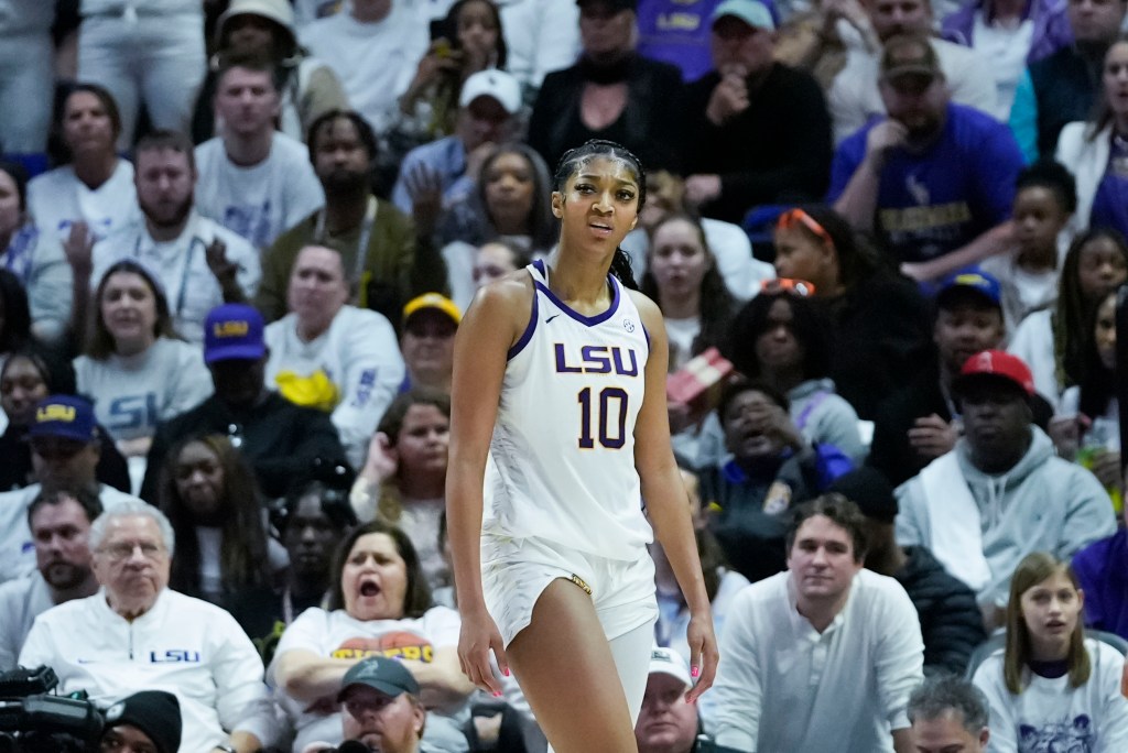 LSU forward Angel Reese (10) reacts after being called for a foul