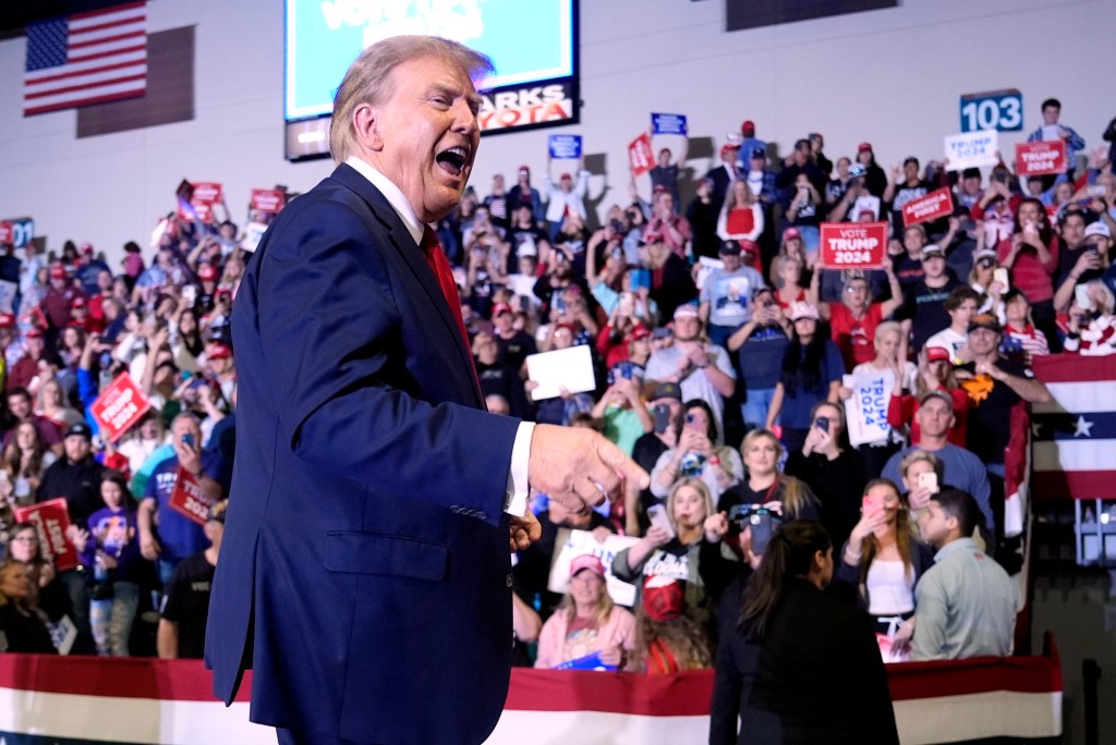 Donald Trump walks off stage after speaking at Get Out The Vote rally at Coastal Carolina University.