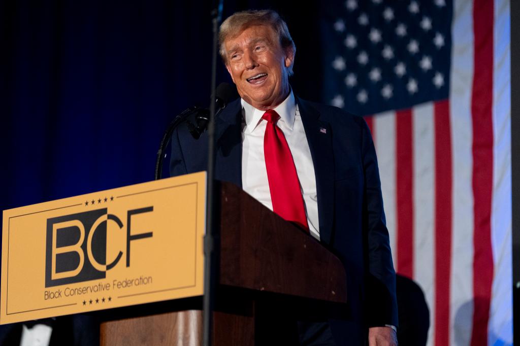 Donald Trump speaking at a podium during the Black Conservative Federation's Annual BCF Honors Gala in Columbia, South Carolina.