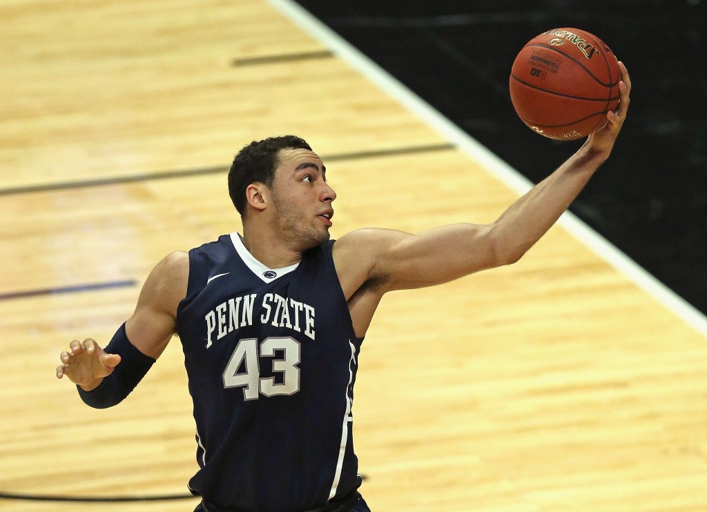 Ross Travis #43 of the Penn State Nittany Lions grabs a pass against the Purdue Boilermakers during the quarterfinal round of the 2015 Big Ten Men's Basketball Tournament at the United Center on March 13, 2015 in Chicago, Illinois.  