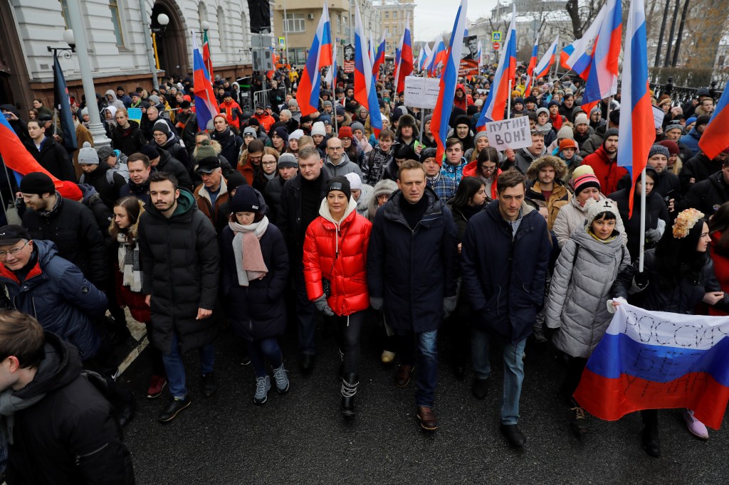 Russian opposition leader Alexei Navalny, his wife Yulia and brother Oleg take part in a march at Strastnoy Boulevard in memory of Russian politician and opposition leader Boris Nemtsov on his 4th death anniversary in Moscow, Russia on February 24, 2019