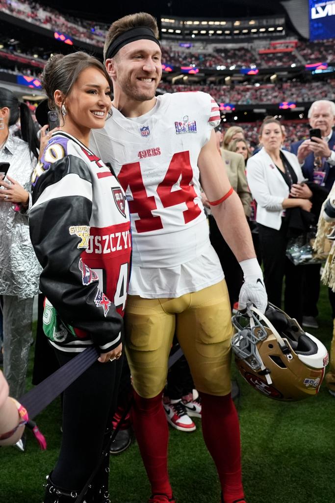 Kristin and Kyle Juszczyk pose for a photo before Super Bowl 2024 between the 49ers and Chiefs.