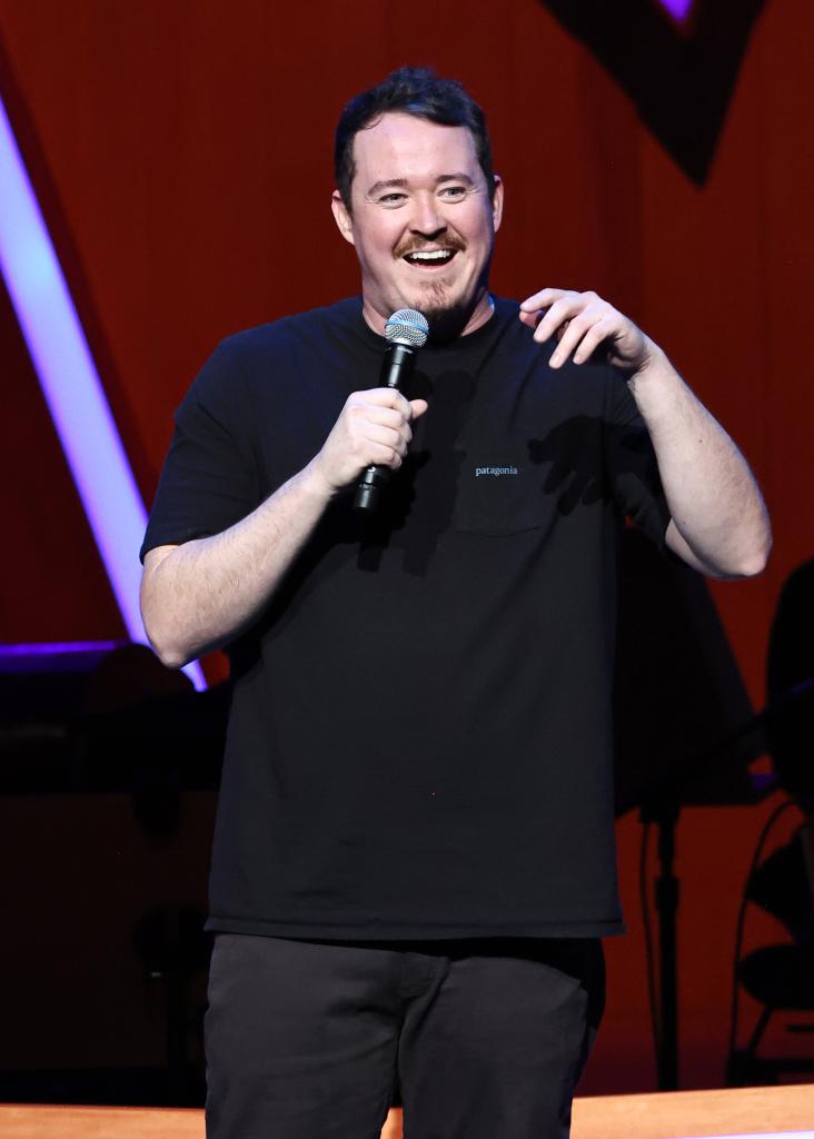 Shane Gillis performing onstage, holding a microphone at the 17th Annual Stand Up For Heroes Benefit presented by Bob Woodruff Foundation and NY Comedy Festival.
