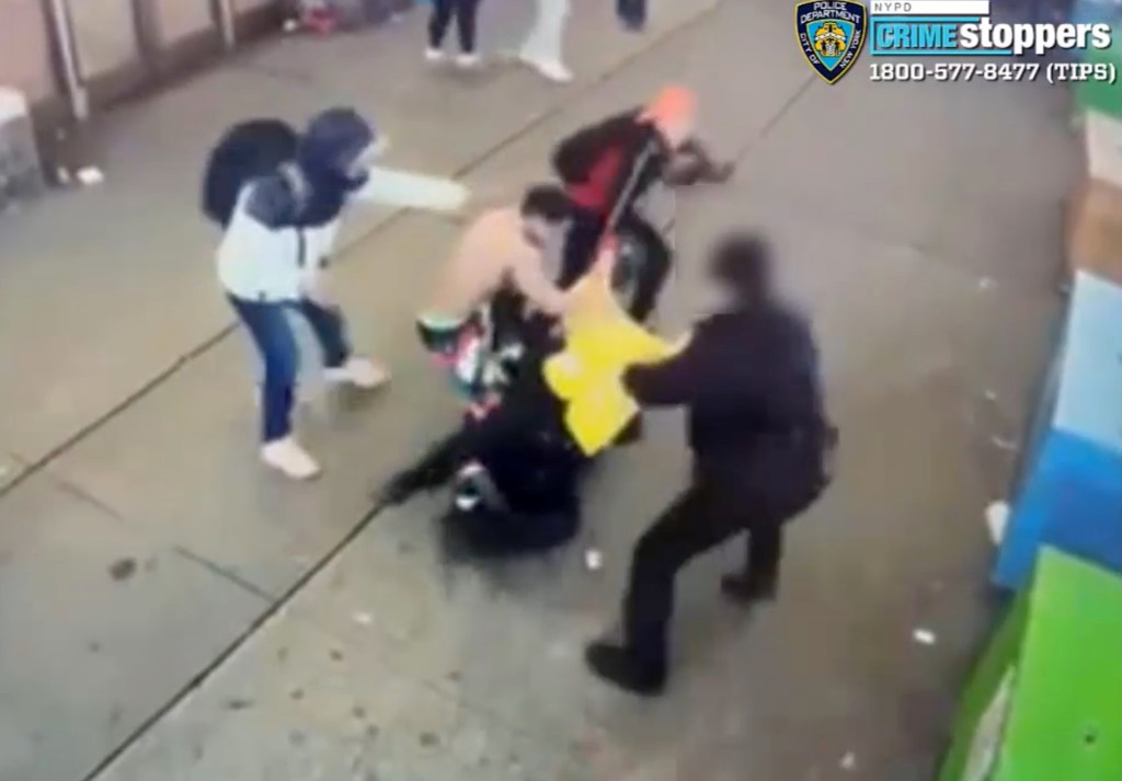 Shocking video captured the moment a migrant mob pounded a pair of cops near Times Square 