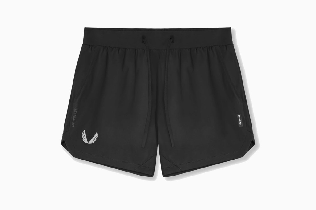 Black shorts with a logo on the side.