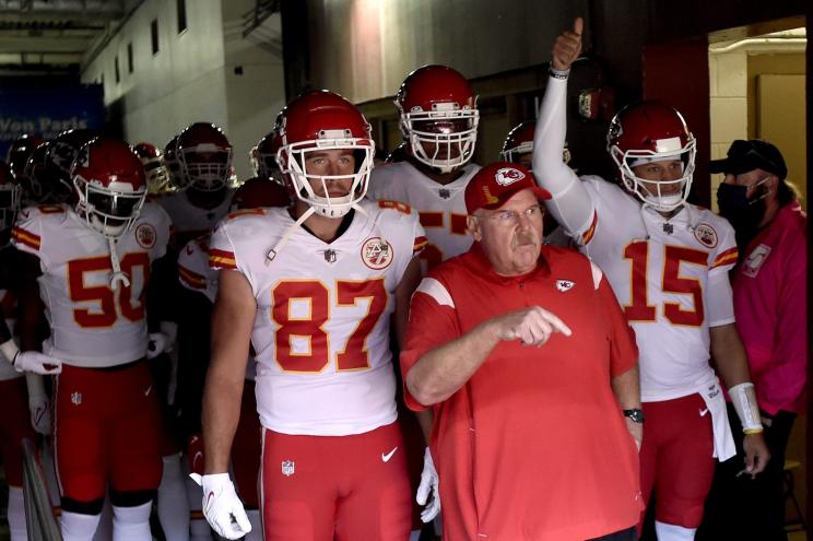 Head Coach Andy Reid, Travis Kelce #87 and Patrick Mahomes #15 of the Kansas City Chiefs.