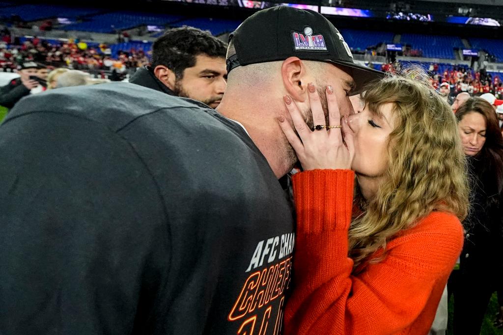 Chiefs tight end Travis Kelce and Taylor Swift celebrated the team's AFC Championship win on Jan. 28, 2024.