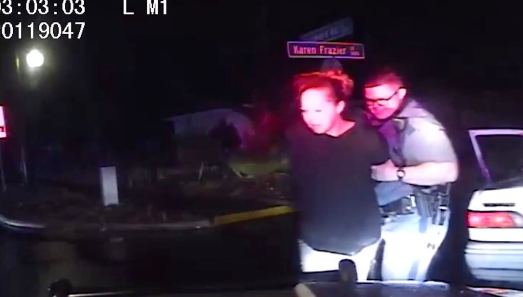 Barnes is seen arresting McClure.