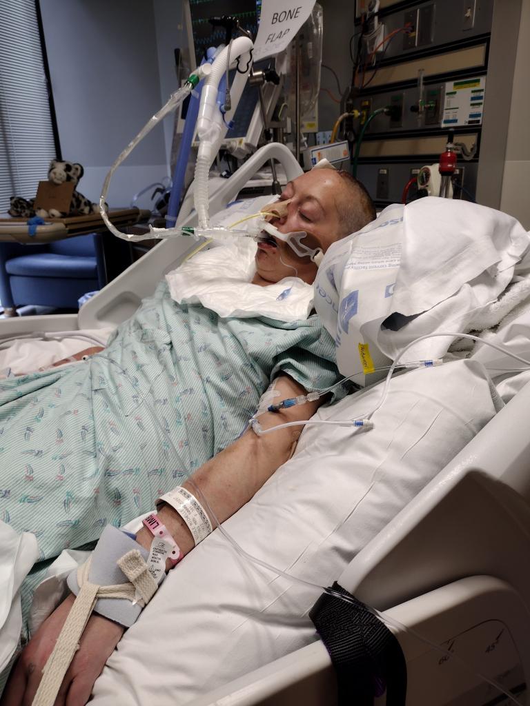 McClure is pictured in the hospital.