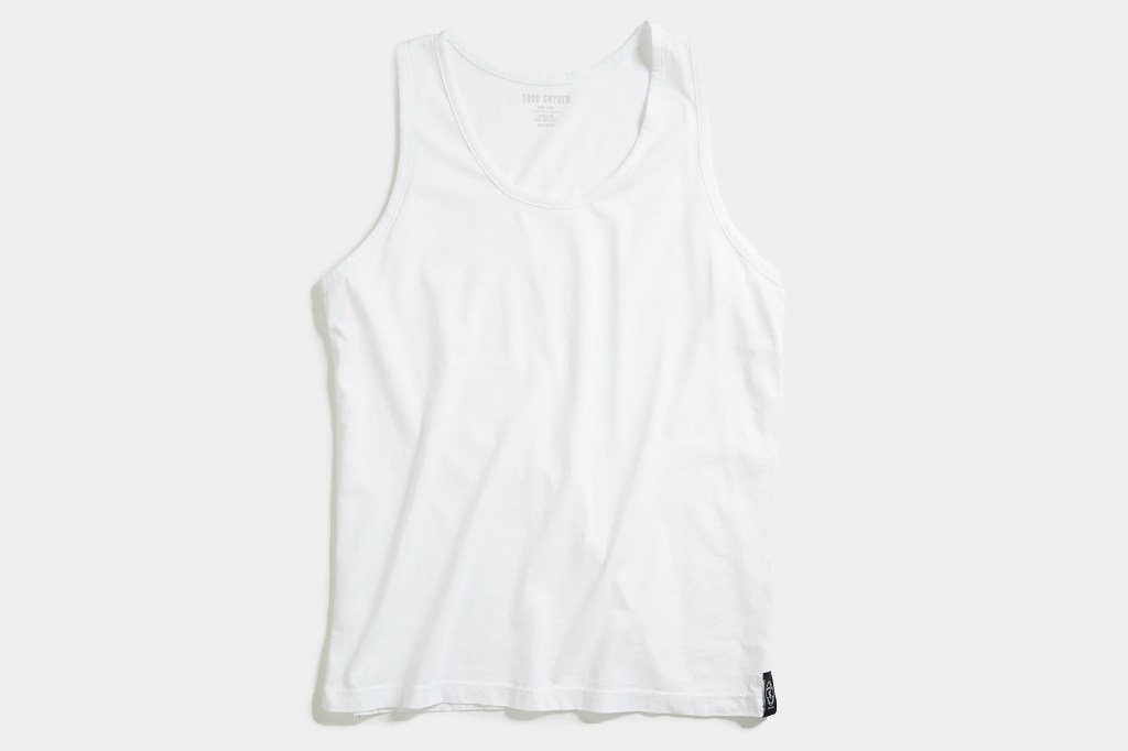 White tank top on white background by Todd Snyder brand worn by Jeremy Allen White, courtesy of the brand.