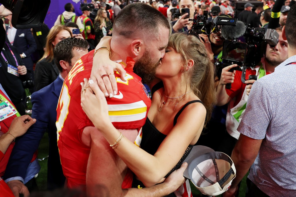 The couple shared a passionate kiss on the field at Allegiant Stadium on Feb. 11, 2024.