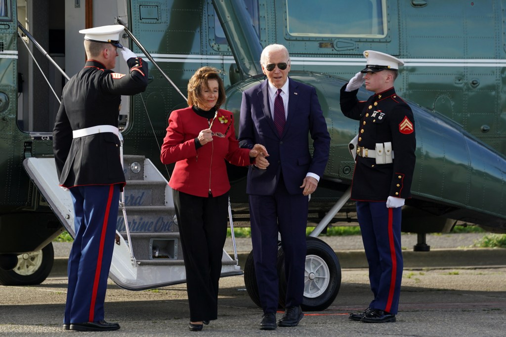 The elderly politicians clutched each other on the tarmac.