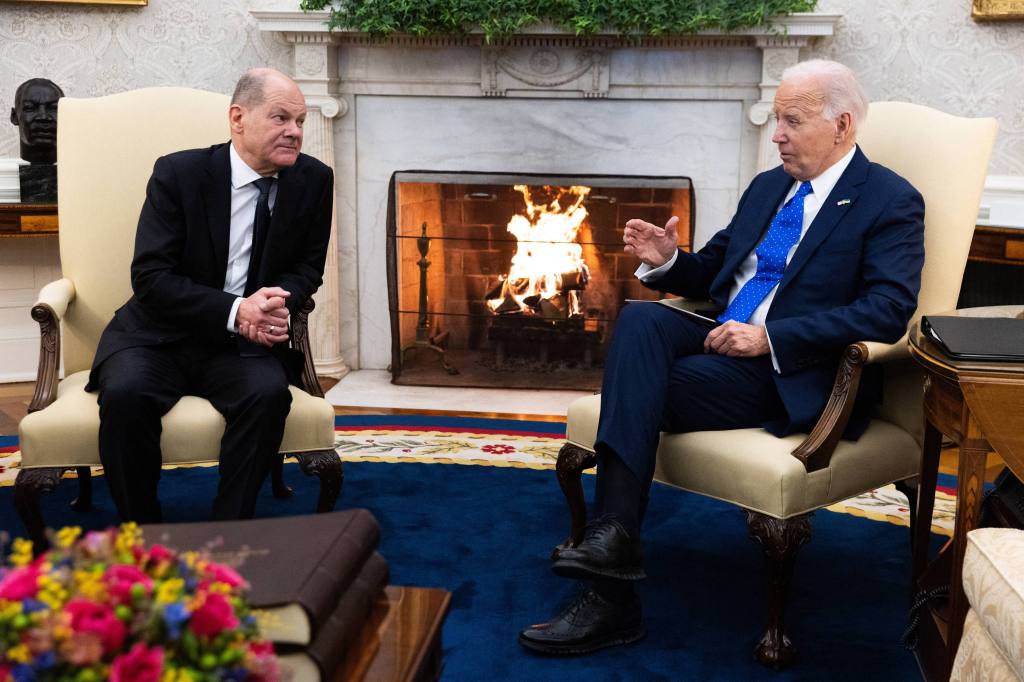 President Joe Biden and German Chancellor Olaf Scholz meet in the Oval Office.