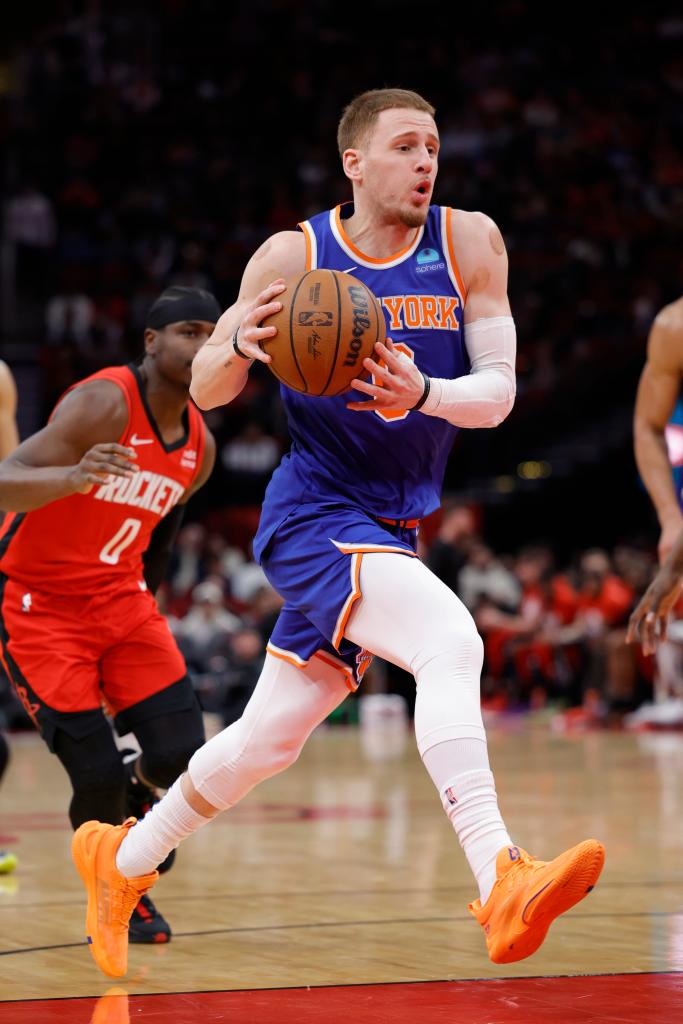 Donte DiVincenzo drives to the rim during the Knicks' loss to the Rockets on Feb. 12, 2024. 