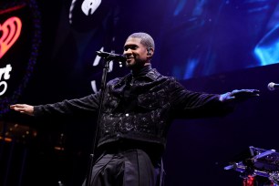 Usher performs onstage during iHeartRadio Q102's Jingle Ball 2023 at Wells Fargo Center.