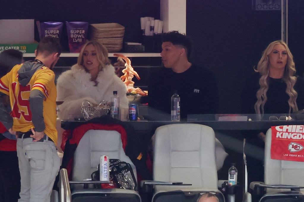 Brittany Mahomes and Jackson Mahomes in a suite at Allegiant Stadium for Super Bowl 2024.