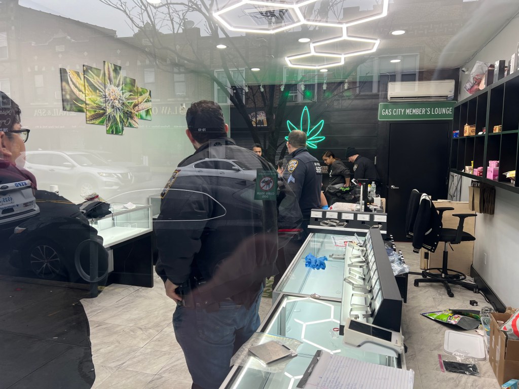 The New York City Sheriff's Office raiding an illegal marijuana shop in Queens on March 5, 2024.