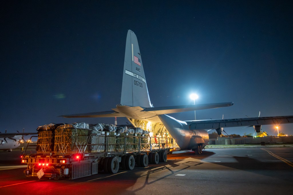 In this image obtained from the US Department of Defense, over 38,000 meals Ready-to-Eat and water destined for an airdrop over Gaza are loaded aboard a US Air Force C-130J Super Hercules at an undisclosed location in Southwest Asia