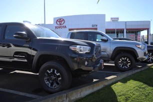 Toyota Tacoma pickup trucks parked in a car lot.