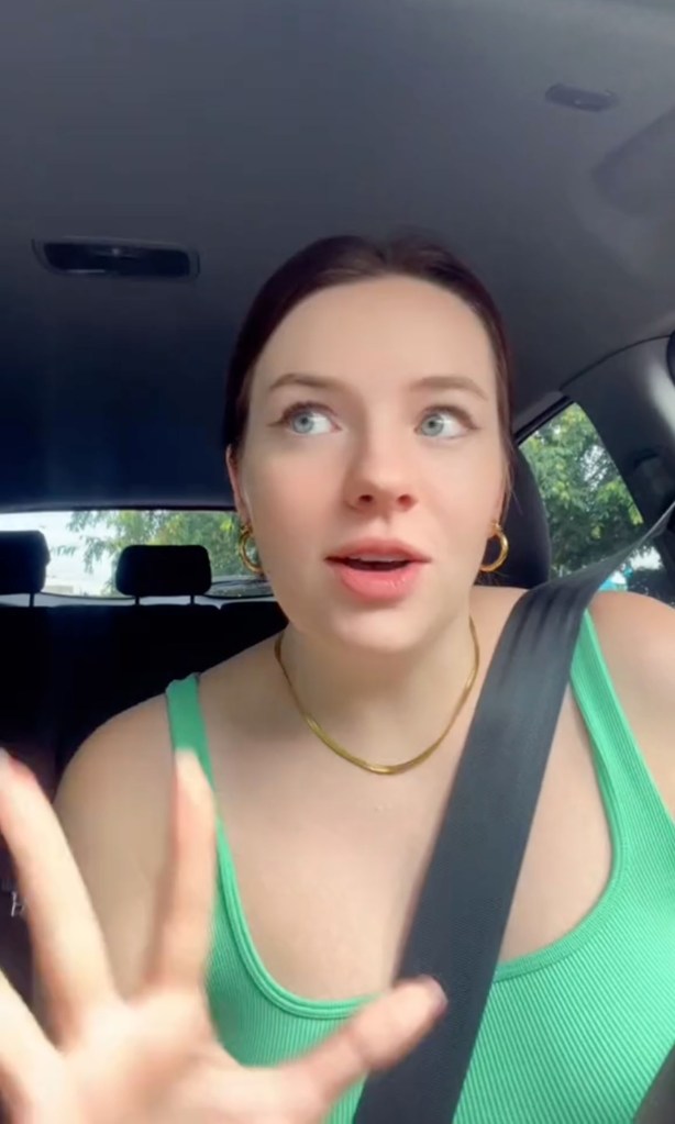 Young Aussie creator Hannah Elliot in a car, creating an online skit about job replacement.