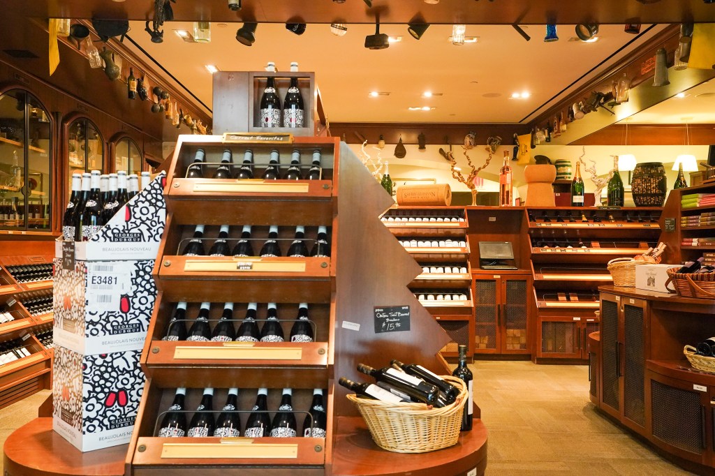 Closed Sherry Lehmann Wines & Spirits store at 505 Park Ave with shelves of wine