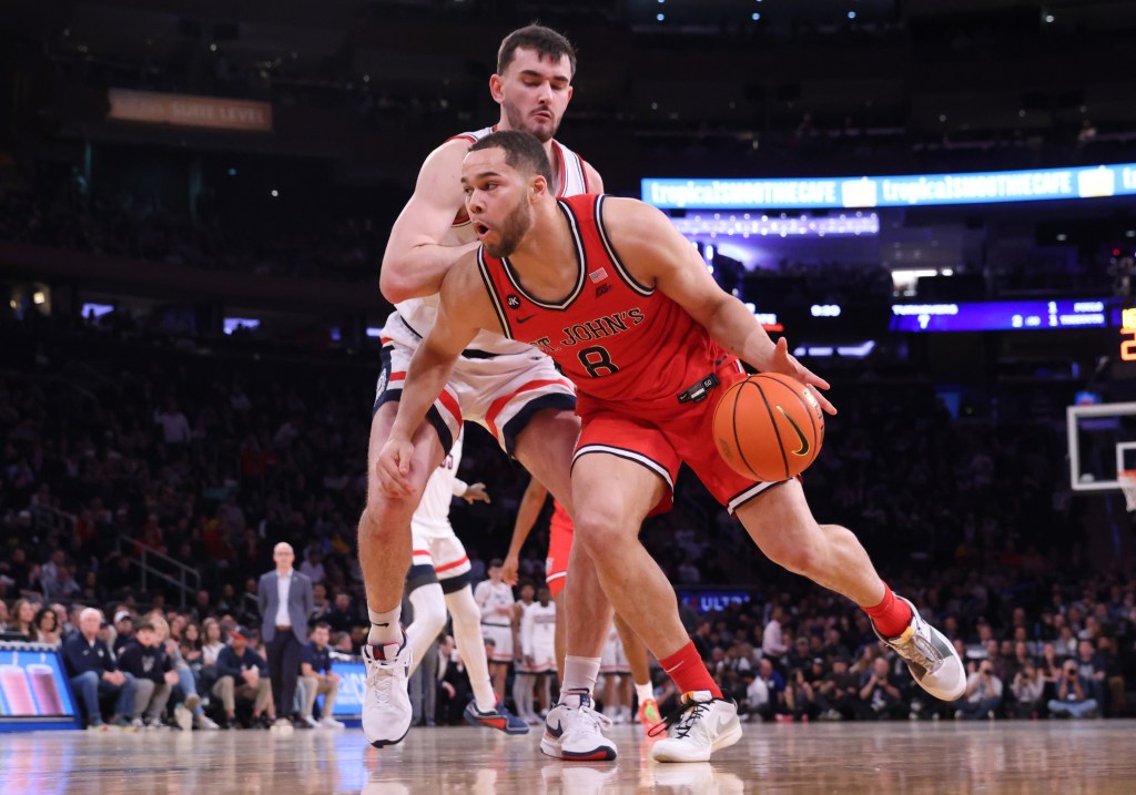 Red Storm guard Chris Ledlum #8 drives to the basket during the second half. 