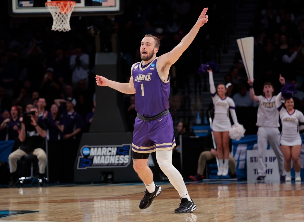 Noah Freidel #1, reacts after shooting a 3-point