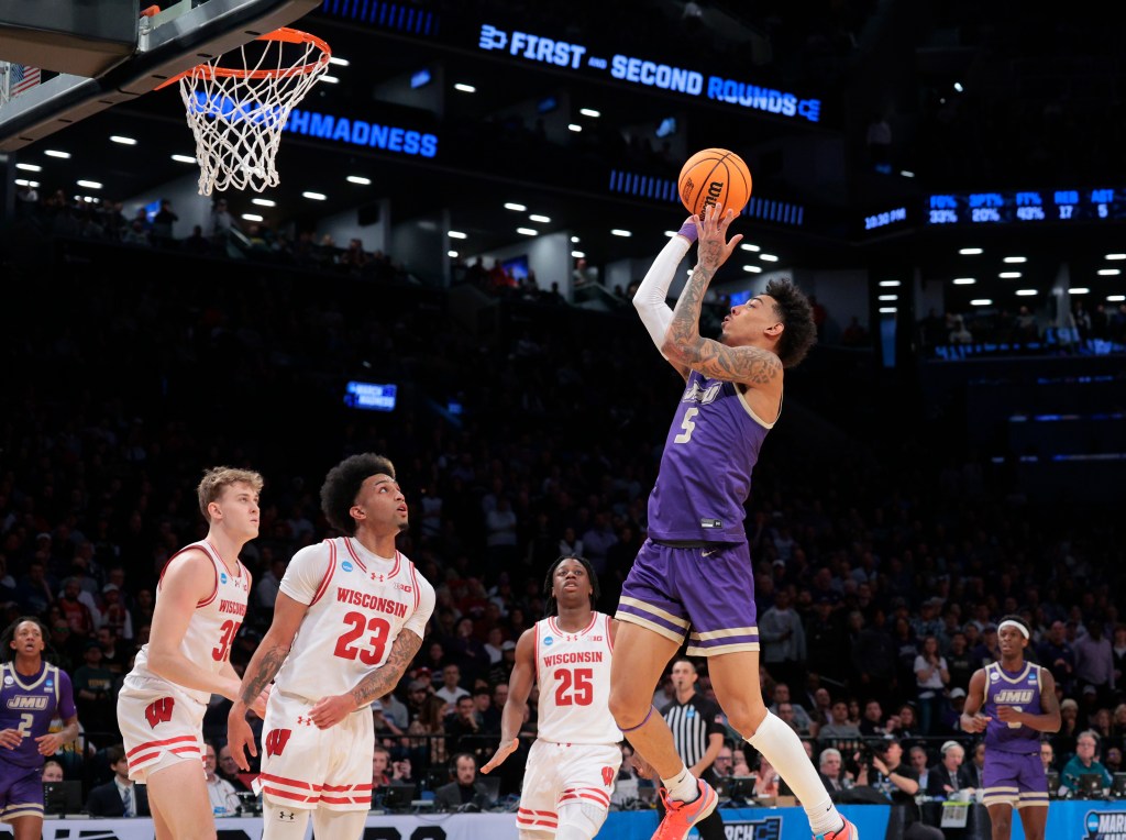 James Madison Dukes vs. Wisconsin Badgers at the Barclays Center in Brooklyn, New York - James Madison Dukes guard Terrence Edwards Jr. #5, driving to the basket in the 1st half.