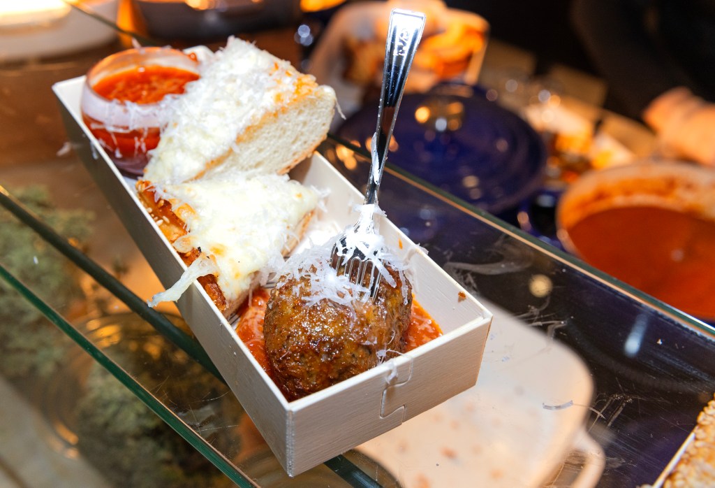 Petroni's meatballs are submerged in pecorino romano cheese, he said.